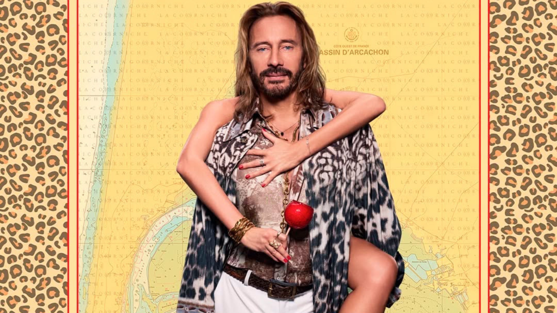 bob sinclar : homme avec une chemise léopard et un pantalon blanc. Une femme enlacée à lui en arrière plan